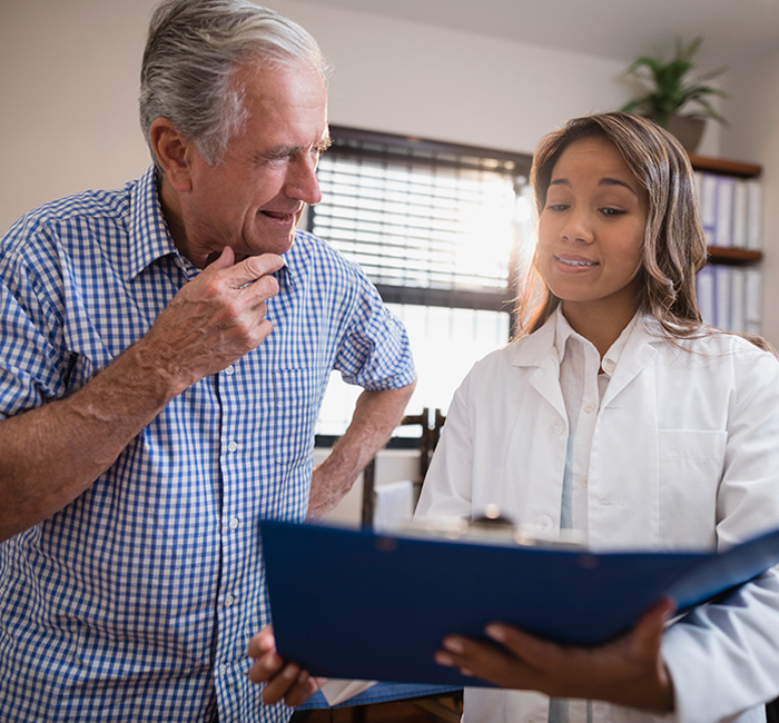 pharmacist talking to patient